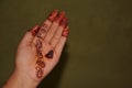 The palm of a girl with Mehandi design Royalty Free Stock Photo