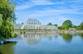 Palm House and Palm House pond in Kew Gardens, London, UK,