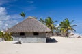 Palm leaf roof bungalow on the tropical beach Royalty Free Stock Photo