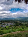 Palm leafe right top background mountains hills green trees small village blue roof pai viewpoint north pai chiang mai