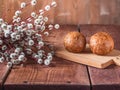 Palm sunday, postcard with blossoming pussy willow branches and two balls of cakes