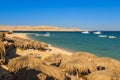 Palm sunshades and beach of Mahmya island egypt Royalty Free Stock Photo