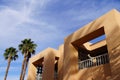 Palm tree and Southwestern architecture Royalty Free Stock Photo