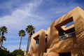 Palm tree and Southwestern architecture Royalty Free Stock Photo