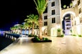 Palm trees and the buildings in the night lights in Marina Porto Royalty Free Stock Photo