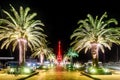 Palm trees and the buildings in the night lights in Marina Porto Royalty Free Stock Photo