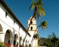 Palm trees in front of Santa Barbara Mission building. Royalty Free Stock Photo