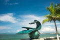 Palm Trees and statues along the Malecon in Puerto Vallarta Royalty Free Stock Photo
