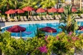 Palm trees and swimming pool in hotel in south Turkey Royalty Free Stock Photo
