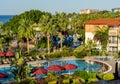 Palm trees and swimming pool in hotel in south Turkey Royalty Free Stock Photo