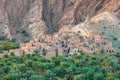 Palm trees and a traditional mountain village in Nizwa,Oman