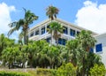 Palm Trees by White Hotel Royalty Free Stock Photo