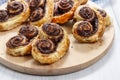 Palmier biscuits - french cookies made of puff pastry and chocolate