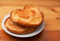 Palmier pastries on saucer Royalty Free Stock Photo