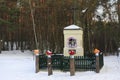 Palmiry, Mazovia, Poland - Traditional roadside shrine in the Kampinoski National Park forest in winter season