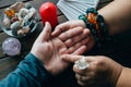 Palmistry fortune teller reads lines on man hand or palm to tell his future, top view Royalty Free Stock Photo