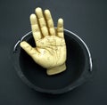 Palmistry hand in cauldron