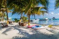 Palms and beach at Caye Caulker island, Beli Royalty Free Stock Photo