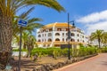 Palms coconut trees and resorts Canary Spanish island Tenerife Africa Royalty Free Stock Photo