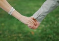 Palms of husband and wife, newlywed. They hold hands. Wedding ring on your finger. Valentine`s day Royalty Free Stock Photo