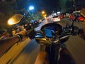 Night ride bike street first person view scooter asia thailand urban city ride Royalty Free Stock Photo