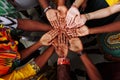 Palms up hands of happy group of multinational African, latin american and european people which stay together in circle Royalty Free Stock Photo