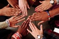 Palms up hands of happy group of multinational African, latin american and european people which stay together in circle Royalty Free Stock Photo