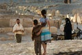 A Syrian family pose for photographs and enjoy the ancient ruins of Palmyra, Syria.