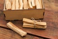 Palo Santo holy wood sticks on wooden table