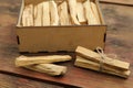 Palo Santo holy wood sticks on wooden table