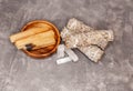 Palo Santo sticks, dried white sage, crystals on a grey background. Royalty Free Stock Photo