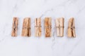 Palo Santo tree sticks on marble background - holy incense tree from Latin America. Meditation, mental health and