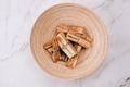 Palo Santo tree sticks in wooden bowl - holy incense tree from Latin America. Meditation, mental health and personal fulfilment