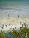 Aerial view of beautiful coastline of Indian ocean with tropical forest, sandy beach, calm blue water and fishing boats in Goa Royalty Free Stock Photo