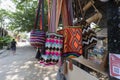 Colorful WayÃÂº ethnic ancient bag hangin up into a rustic gift shop Royalty Free Stock Photo