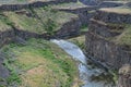 The Palouse river flows through ancient cliffs at Palouse Falls State Park, Washington, USA