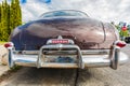 Chrome rear bumper of a vintage Hudson Wasp