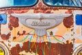 Details of a rusted vintage Flxible brand bus