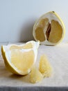 Pamela fruit, cut into pieces, on a white background Royalty Free Stock Photo