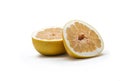 Pamelo citrus fruit. Fresh juicy yellow pamelo cut in half isolated on a white background