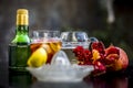 Pamosa or pomosa drink or classic mimosa drink in a transparent glass with champagne,pomegranate juice or annar ka juice,lemon jui Royalty Free Stock Photo