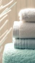 Pampering perfection Luxurious stack of fresh towels for ultimate comfort