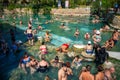 Pamukale, Turkey - September 14, 2022: Tourists enjoying the Antique pool Cleopatra's Bath in Pamukkale, Turkey