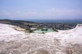 Pamukkale travertine pools and terraces carbonate mineral at ancient Hierapolis panorama view, Turkey Royalty Free Stock Photo