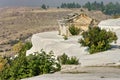 Landscape with famous terraces and ruins of Hierapolis city - Landmark attraction in Pamukkale, Turkey Royalty Free Stock Photo