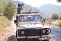 PAMUKKALE, TURKEY - September 18 2015: A group of tourists in a retro jeep rides a safari