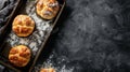 A pan of breads on a baking sheet with sugar sprinkled over them, AI