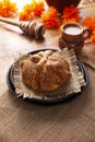 Pan de Muerto with sesame seeds and Hot Chocolate