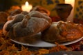 Sugary and traditional bread of the dead, celebrating dia de muertos with cempasuchilt flowers