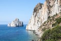 Pan di Zucchero rocks in the sea and Masuas sea stack (Nedida), Royalty Free Stock Photo